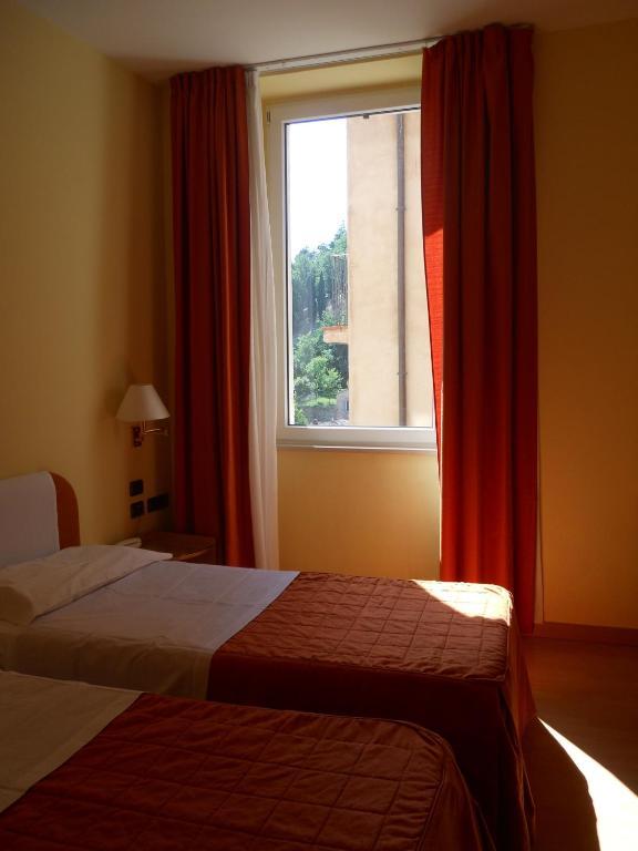 Albergo Italia Urbino Szoba fotó